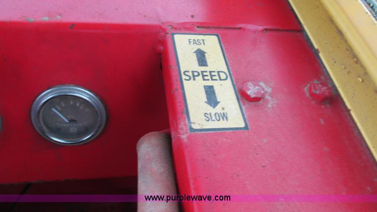 image for item I3248 New Holland 1049 Stackcruiser self-propelled bale wagon