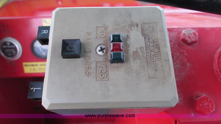 image for item I3248 New Holland 1049 Stackcruiser self-propelled bale wagon