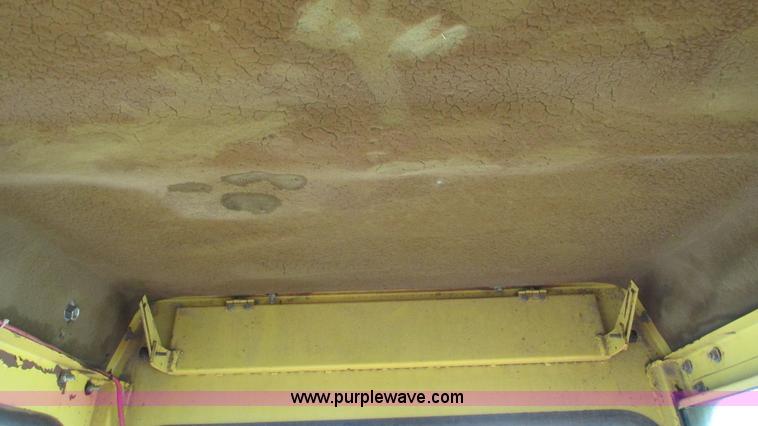 image for item I3248 New Holland 1049 Stackcruiser self-propelled bale wagon