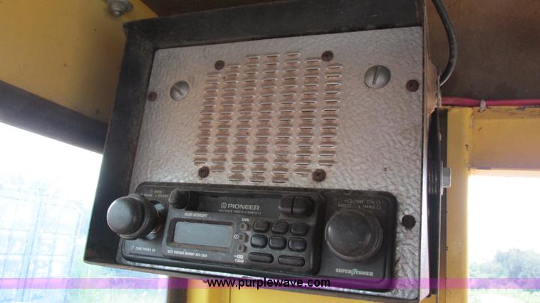 image for item I3248 New Holland 1049 Stackcruiser self-propelled bale wagon