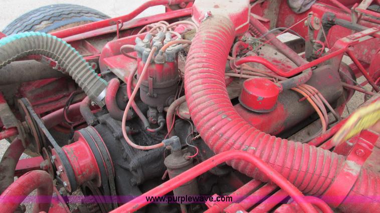 image for item I3248 New Holland 1049 Stackcruiser self-propelled bale wagon