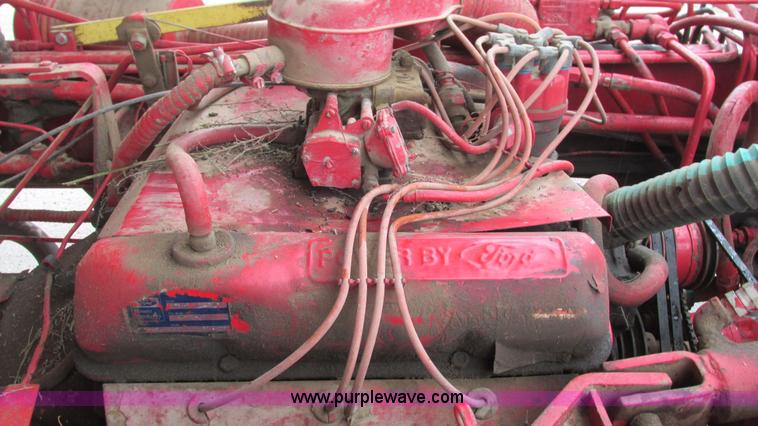 image for item I3248 New Holland 1049 Stackcruiser self-propelled bale wagon