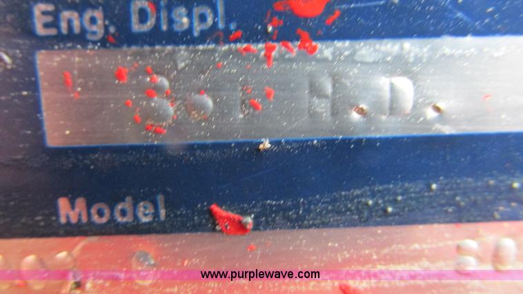 image for item I3248 New Holland 1049 Stackcruiser self-propelled bale wagon