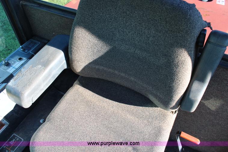 image for item J2219 1995 New Holland 2550 swather