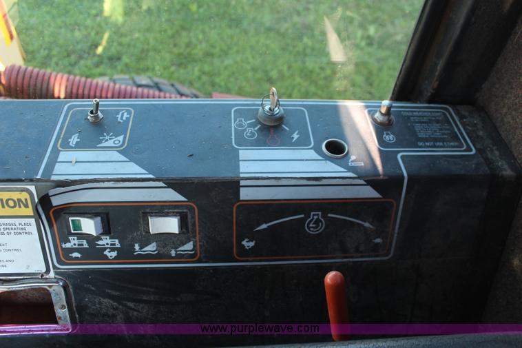 image for item J2219 1995 New Holland 2550 swather