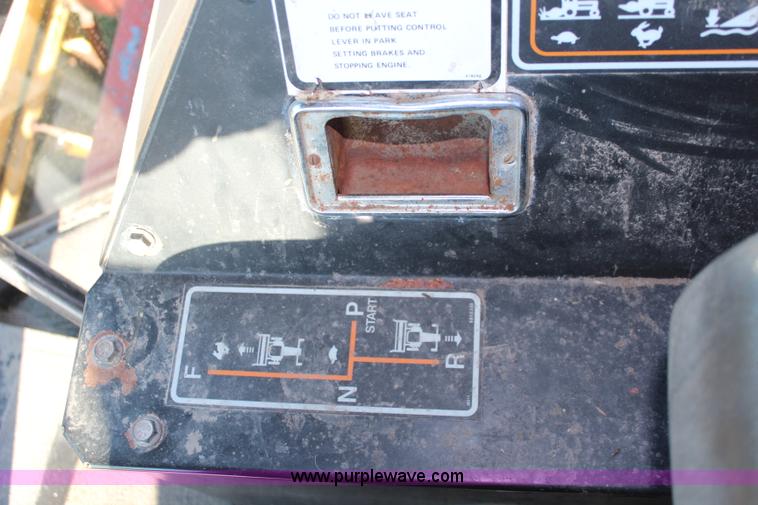 image for item J2219 1995 New Holland 2550 swather