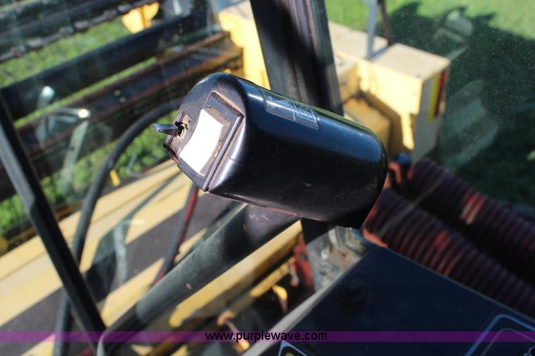 image for item J2219 1995 New Holland 2550 swather