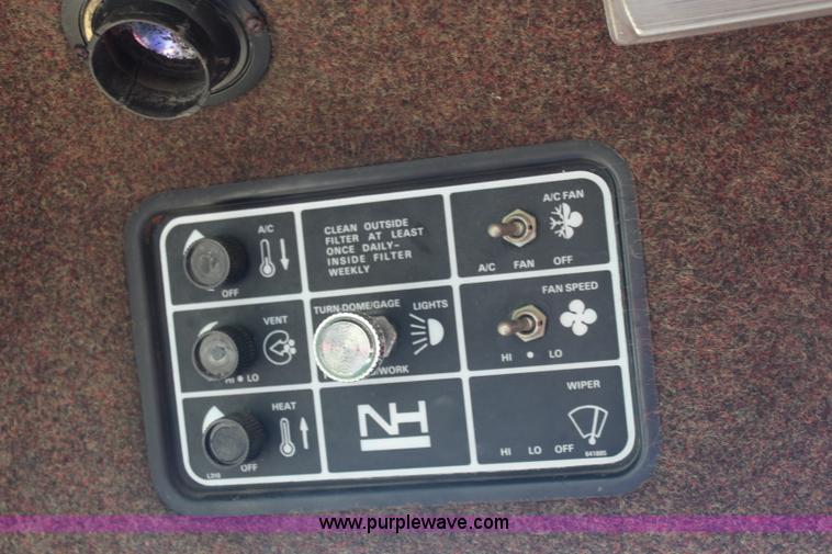 image for item J2219 1995 New Holland 2550 swather