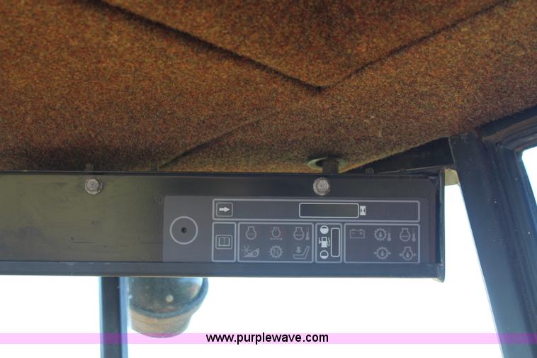 image for item J2219 1995 New Holland 2550 swather