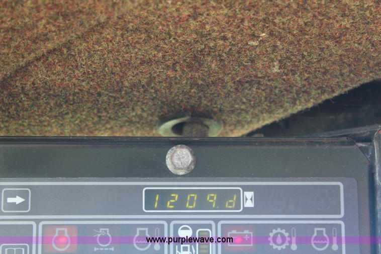 image for item J2219 1995 New Holland 2550 swather