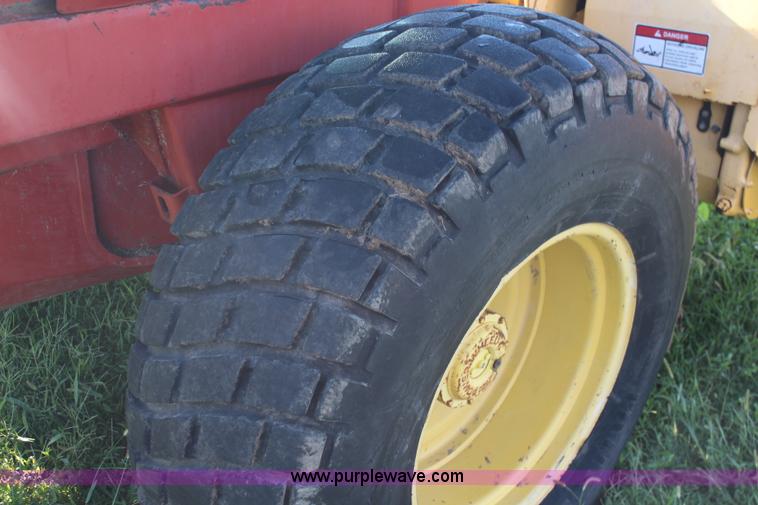 image for item J2219 1995 New Holland 2550 swather