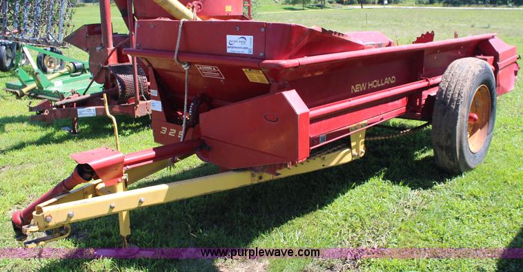 image for item J2222 New Holland 329 manure spreader