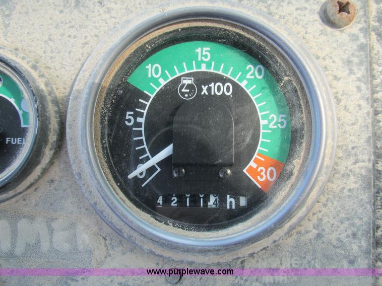 image for item AW9934 1990 John Deere 310C backhoe