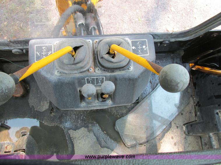 image for item AW9934 1990 John Deere 310C backhoe