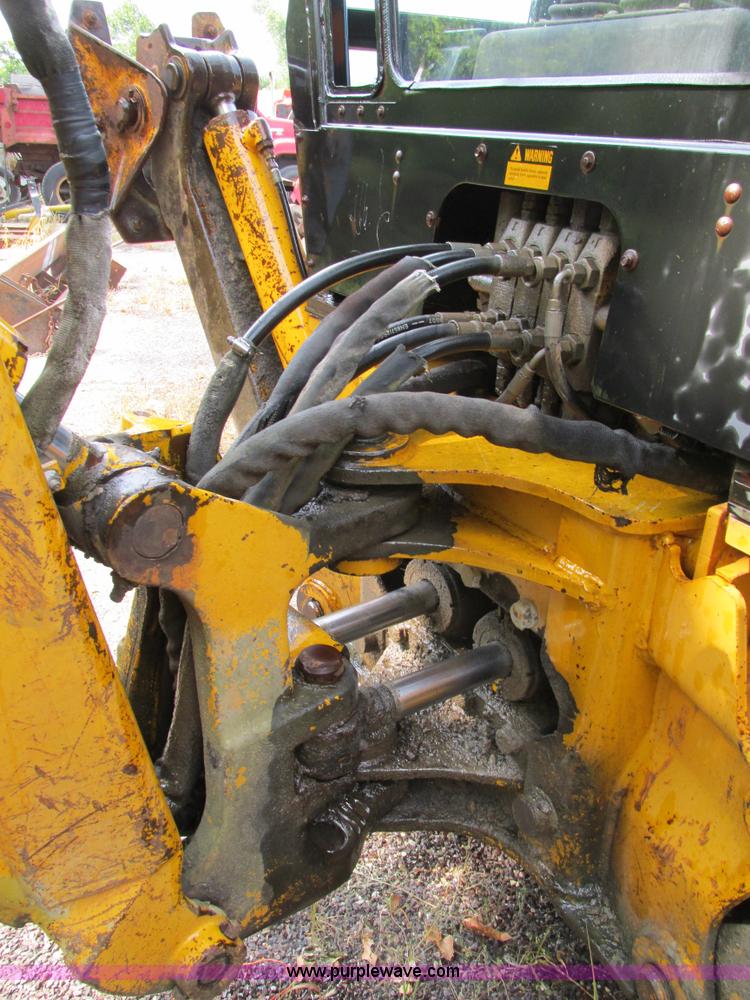 image for item AW9934 1990 John Deere 310C backhoe