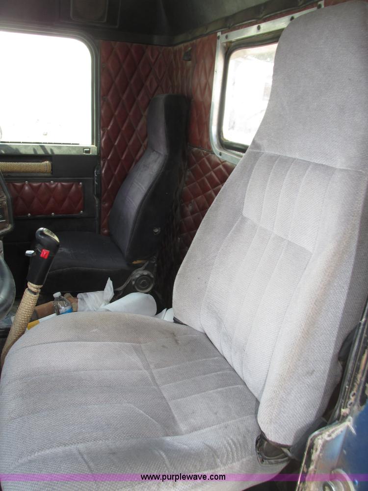 image for item F7469 1984 Freightliner Conventional FLC 120 semi truck