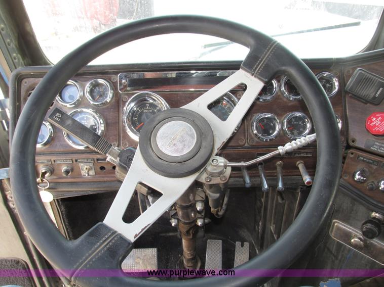 image for item F7469 1984 Freightliner Conventional FLC 120 semi truck