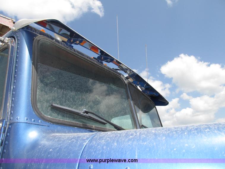 image for item F7469 1984 Freightliner Conventional FLC 120 semi truck