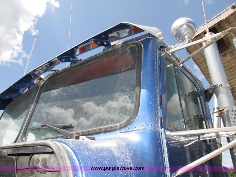 image for item F7469 1984 Freightliner Conventional FLC 120 semi truck