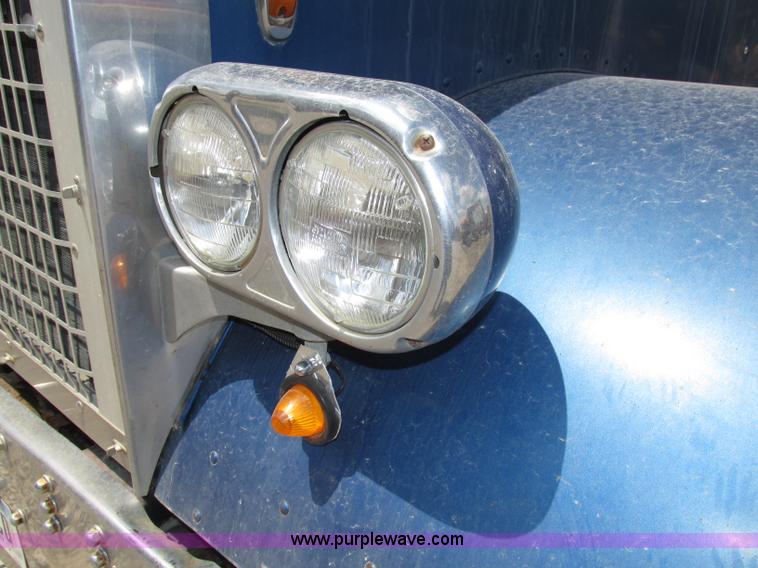 image for item F7469 1984 Freightliner Conventional FLC 120 semi truck