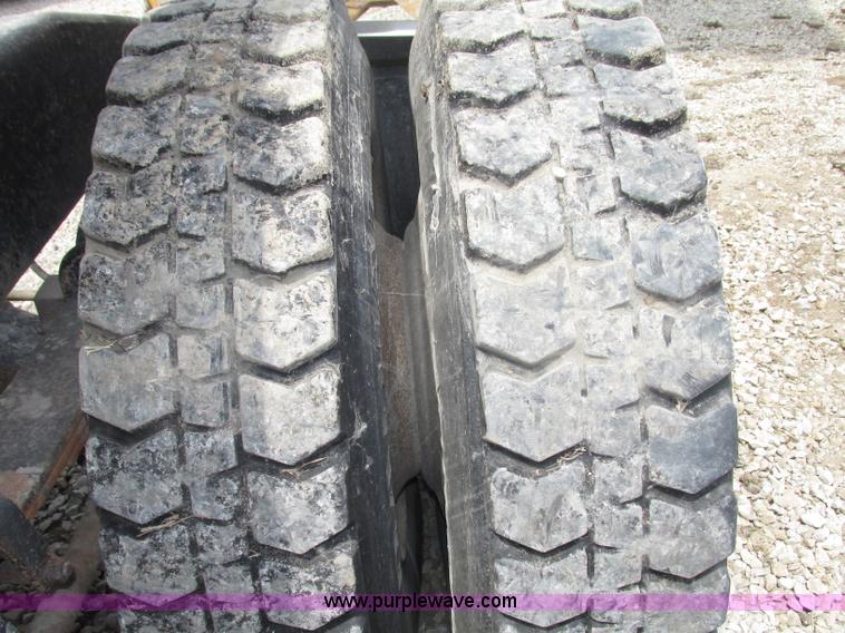 image for item F7469 1984 Freightliner Conventional FLC 120 semi truck