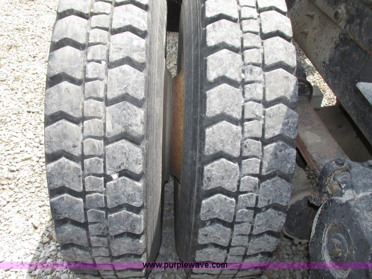 image for item F7469 1984 Freightliner Conventional FLC 120 semi truck