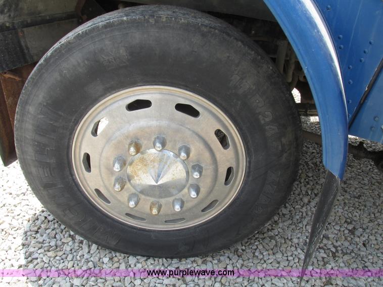 image for item F7469 1984 Freightliner Conventional FLC 120 semi truck