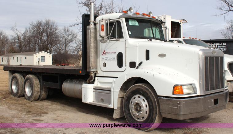 image for item H1375 1997 Peterbilt 377 flatbed truck