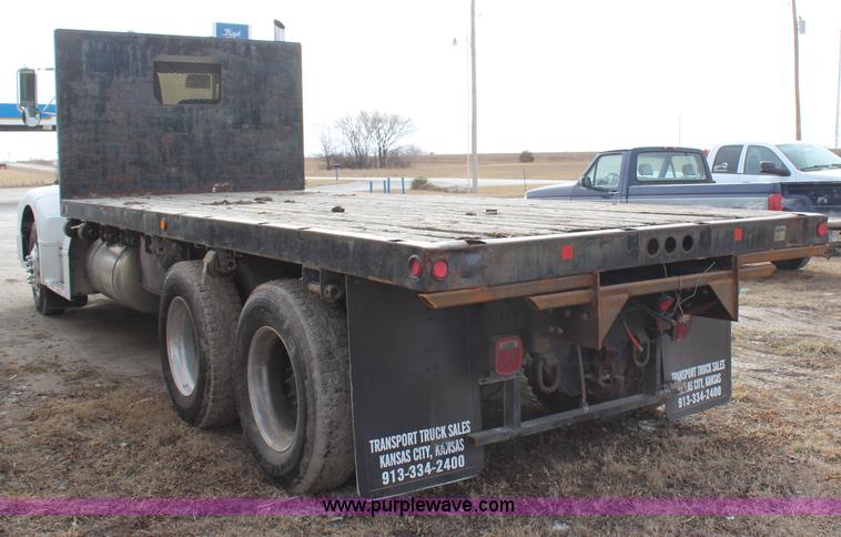 image for item H1375 1997 Peterbilt 377 flatbed truck