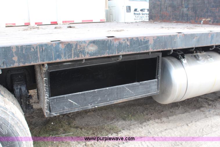image for item H1375 1997 Peterbilt 377 flatbed truck