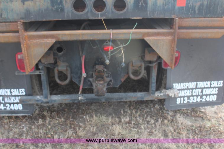 image for item H1375 1997 Peterbilt 377 flatbed truck