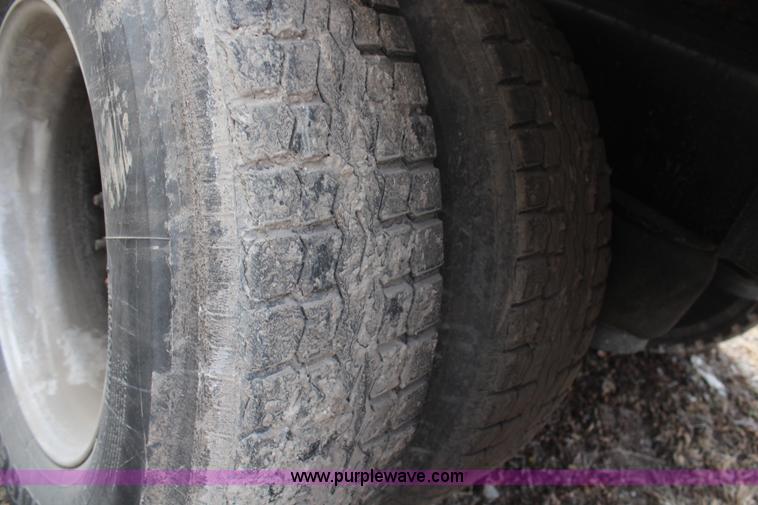 image for item H1375 1997 Peterbilt 377 flatbed truck