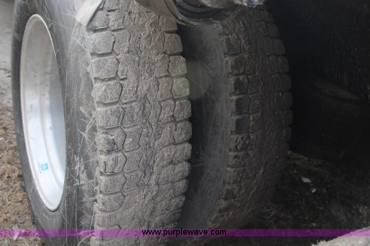 image for item H1375 1997 Peterbilt 377 flatbed truck