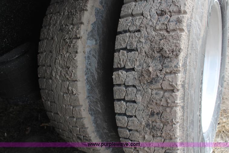 image for item H1375 1997 Peterbilt 377 flatbed truck