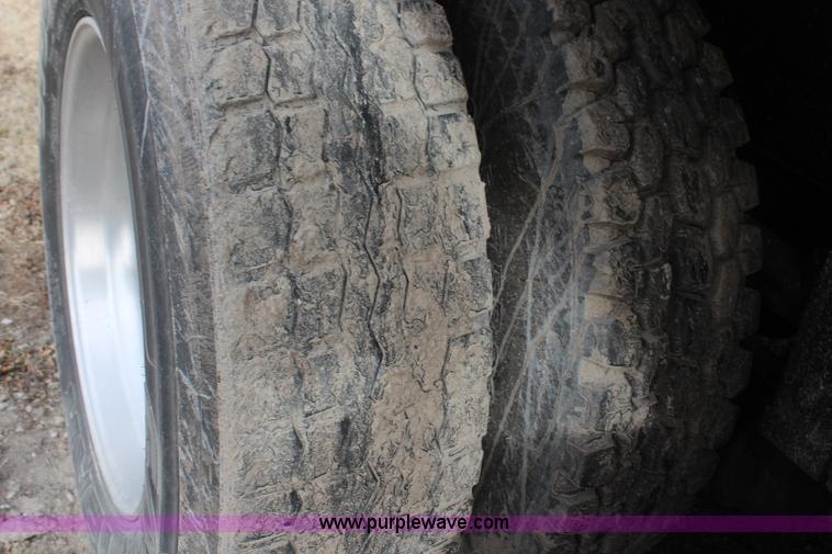 image for item H1375 1997 Peterbilt 377 flatbed truck