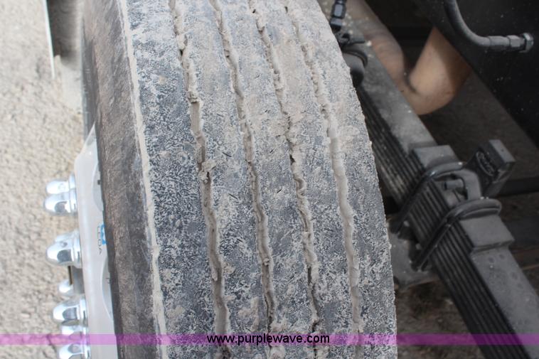 image for item H1375 1997 Peterbilt 377 flatbed truck