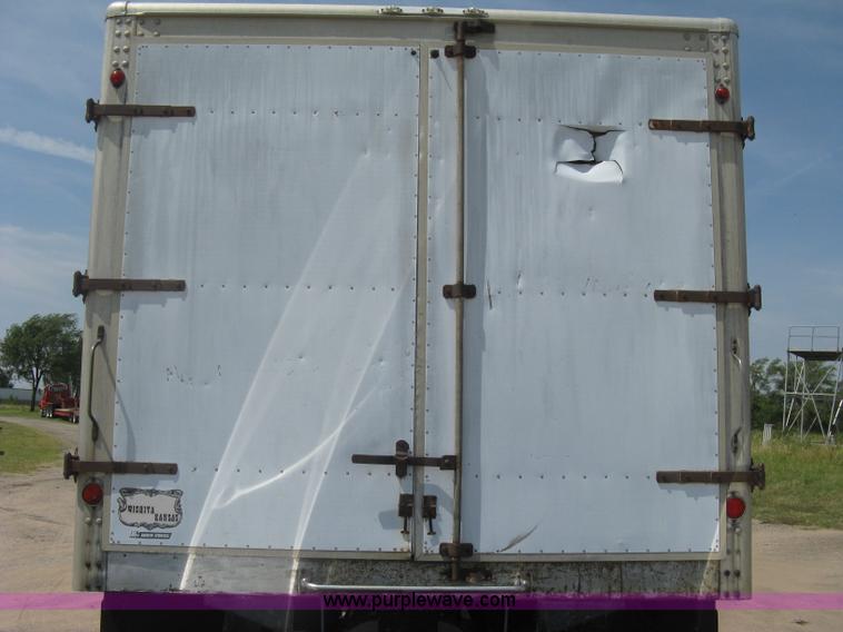 image for item H5270 1999 Sterling L8500 Series crew cab cargo/bobtail truck