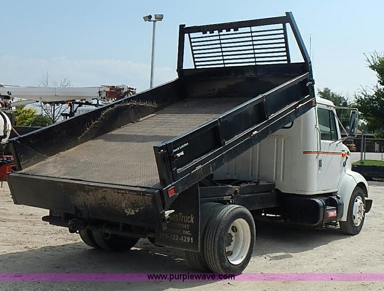 image for item I3549 1995 International 4700 Lo Profile flatbed truck