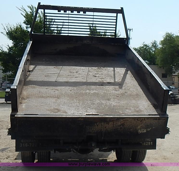 image for item I3549 1995 International 4700 Lo Profile flatbed truck