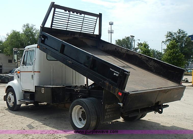 image for item I3549 1995 International 4700 Lo Profile flatbed truck