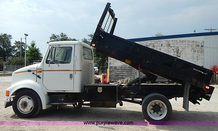 image for item I3549 1995 International 4700 Lo Profile flatbed truck