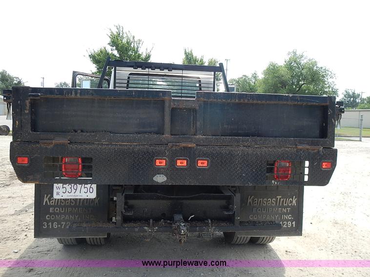 image for item I3549 1995 International 4700 Lo Profile flatbed truck