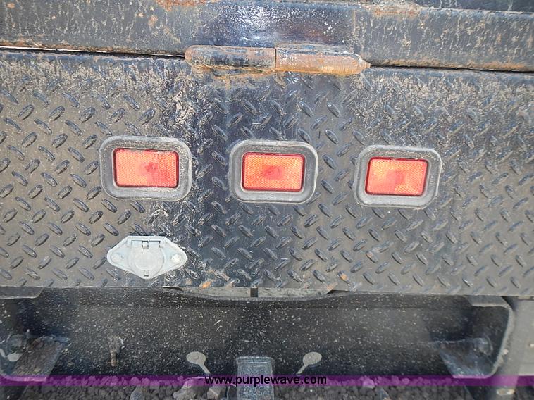 image for item I3549 1995 International 4700 Lo Profile flatbed truck