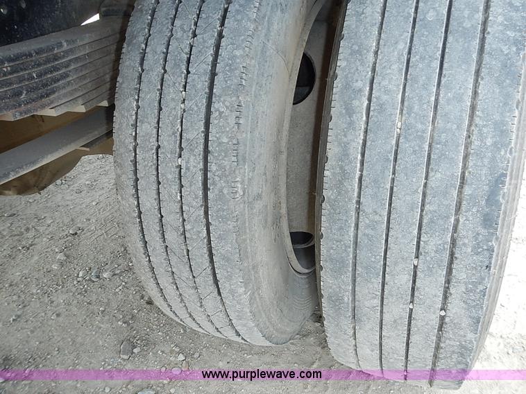 image for item I3549 1995 International 4700 Lo Profile flatbed truck