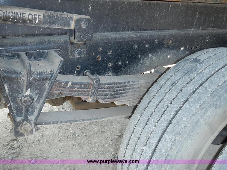 image for item I3549 1995 International 4700 Lo Profile flatbed truck