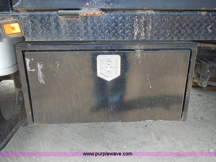 image for item I3549 1995 International 4700 Lo Profile flatbed truck