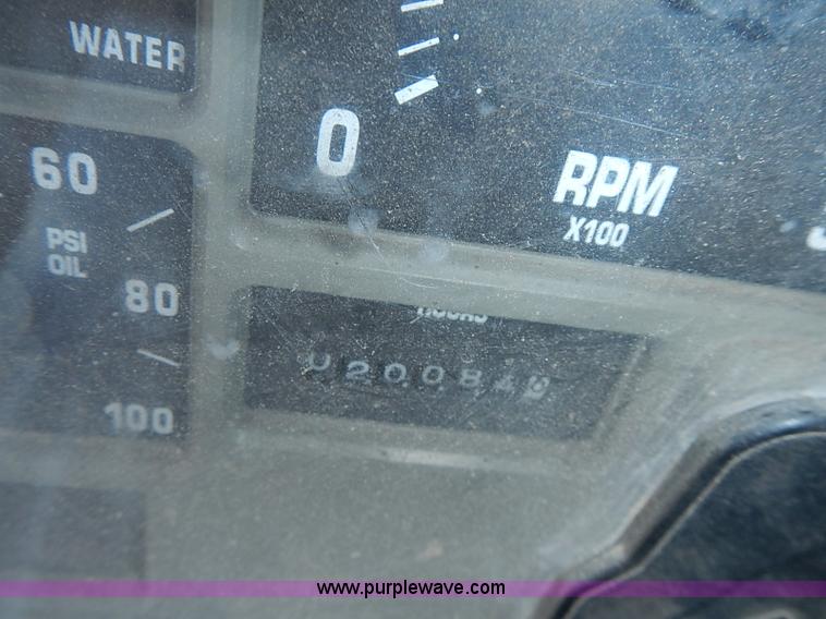 image for item I3549 1995 International 4700 Lo Profile flatbed truck