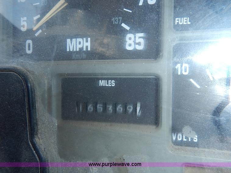 image for item I3549 1995 International 4700 Lo Profile flatbed truck