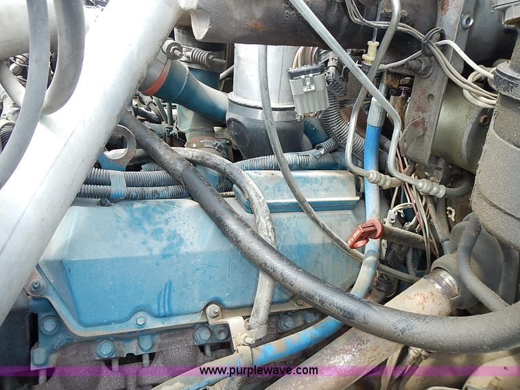 image for item I3549 1995 International 4700 Lo Profile flatbed truck