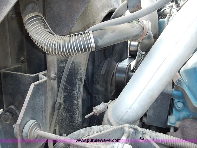 image for item I3549 1995 International 4700 Lo Profile flatbed truck